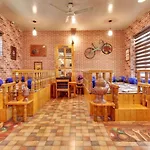 Super Oyo Capital O 91600 The Village Classic Hotel And Restaurant